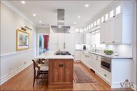 Transitional cabinets, white cabinetry, custom handles, carpeting, accessories
