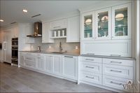 white finish, classic look, custom cabinets, fully customized space, fit, drawers, upward opening, glass finishes, built in, range, hood, columns, fit