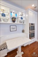 Banquette in white, custom banquette, built-in banquette, built-in bench eatery, dining solutions
