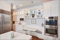 Custom, built-in, storage, utility, large cabinets, shelves between cabinets, built in shelving unit
