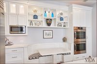 Banquette, dual ovens, pantry, crown moulding, finishes, heigh ceilings, nook