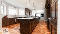 Classic, traditional, walnut brown, open concept, classic handles, barn, exes, gorgeous, kitchen inspiration, cross styles.