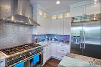 Custom kitchen designs, interior designer, custom handles, spice racks, shelves, built in shelving