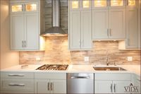 built in, stove top, sink, custom cabinet lighting, under cabinet lights, glass displays, display shelves, display cabinets, tall cabinets, luxury cabinets